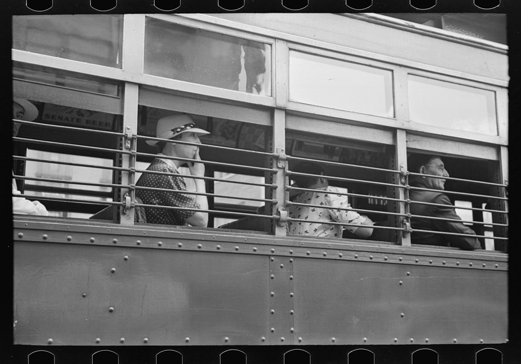 Passengers riding a Washington DC streetcar, 1938